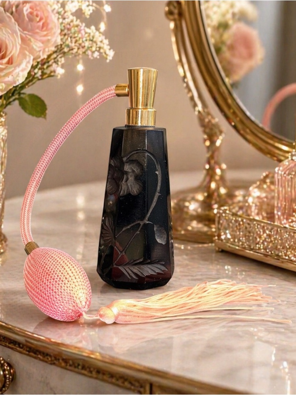 Bohemian Czech black art glass perfume atomizer bottle.